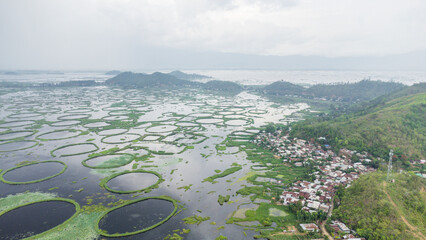Aerial view loktak lake is the largest freshwater lake and thanga village in India as well as the largest lake in North East India.