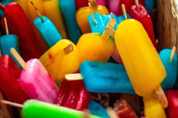 Colorful assortment of ice cream sticks, each flavor a vibrant hue, tempting taste buds with their...