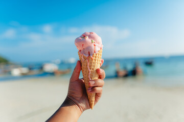 Ice cream cone at the beach in summer
