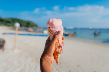 Ice cream cone at the beach in summer