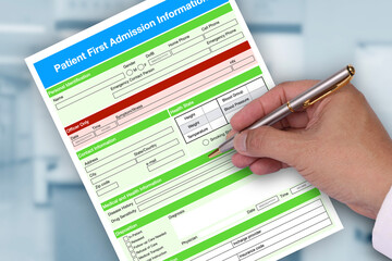 Someone fill out blank patient first admission form.