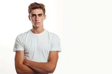 Obraz premium A young man in a white t shirt on a white background.