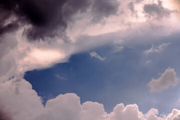 Naklejka na ściany i meble Cloudscape has been developing in gorgeous form. The vast blue sky and clouds sky background