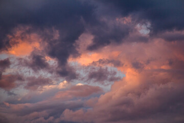 Cloudscape, Colored Clouds at Sunset near the Ocean on a Cloudy Day