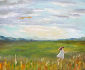 A girl in a field with a kite