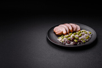 Delicious white cooked rice with green edamame beans with salt and spices