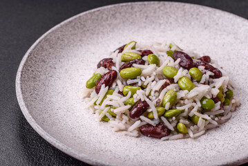 Delicious white cooked rice with green edamame beans with salt and spices