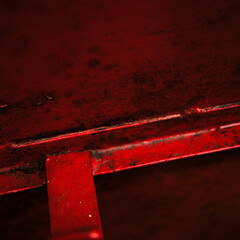 red heavy metal close up. The power of the red color