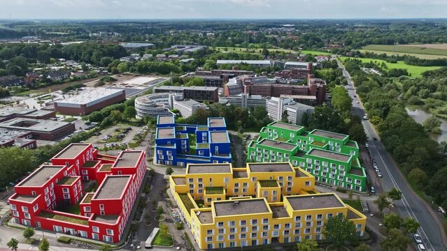 An aerial drone view of colorful buildings in M&uuml;nster, Germany.