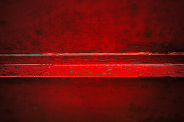 red heavy metal close up. The power of the red color