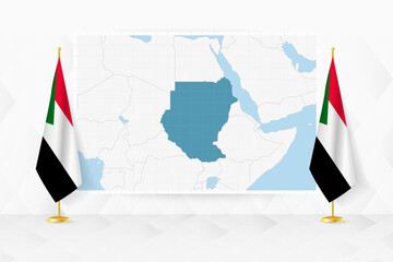 Map of Sudan and flags of Sudan on flag stand. - 782020872