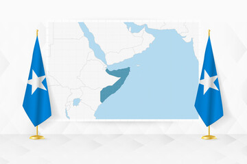 Map of Somalia and flags of Somalia on flag stand. - 782020892
