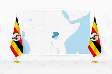 Map of Uganda and flags of Uganda on flag stand. - 782020898