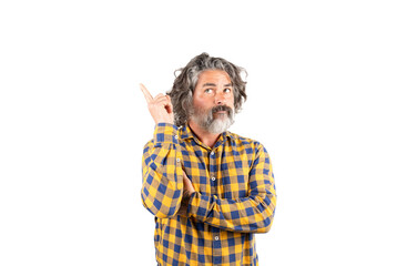 Bearded man pointing his finger with an expression of interest