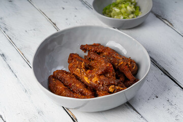 spicy steamed chicken feet that is very popular across Asia