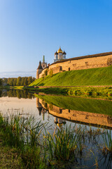 Naklejka na ściany i meble Pskov, Russia, September 11, 2023. View of the fortress walls and domes of the cathedral.