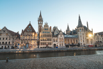 Fototapeta na wymiar Ghent promenade called the Graslei and the charming historic houses at sunrise. The centre of the Belgian city. Flanders