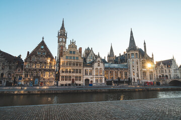 Ghent promenade called the Graslei and the charming historic houses at sunrise. The centre of the...