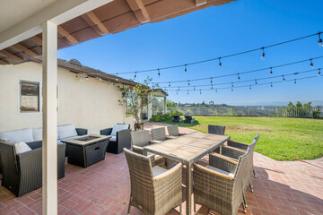 Spacious patio with fire pit and grill in Hidden Hills, CA
