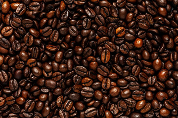 Creative backdrop made of coffee beans. Love coffee concept.