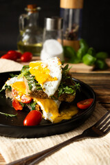 Sandwich with egg. on a wooden background. breakfast