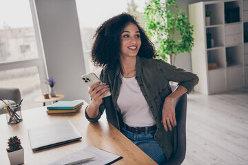 Photo of happy shiny lady trader dressed shirt texting sms instagram twitter telegram facebook...