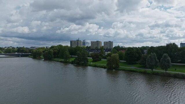 An aerial drone view of Aasee Lake in M&uuml;nster . Lake Aasee is an artificial lake located in M&uuml;nster , Germany .