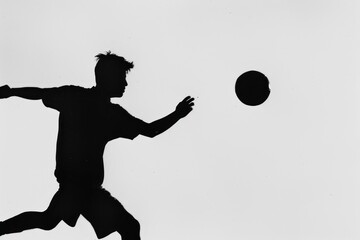 soccer player is silhouetted and on a white background