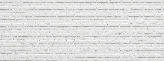white brick wall with smooth texture, backdrop for photography or wallpaper design. wide panoramic banner background