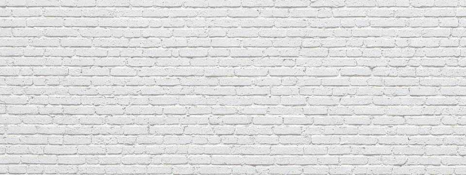 Fototapeta white brick wall with smooth texture, backdrop for photography or wallpaper design. wide panoramic banner background