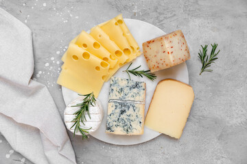 Cheese platter with craft cheese assortment  hard cheeses, mold cheese, gorgonzola, pecorino, Emmental, Roquefort