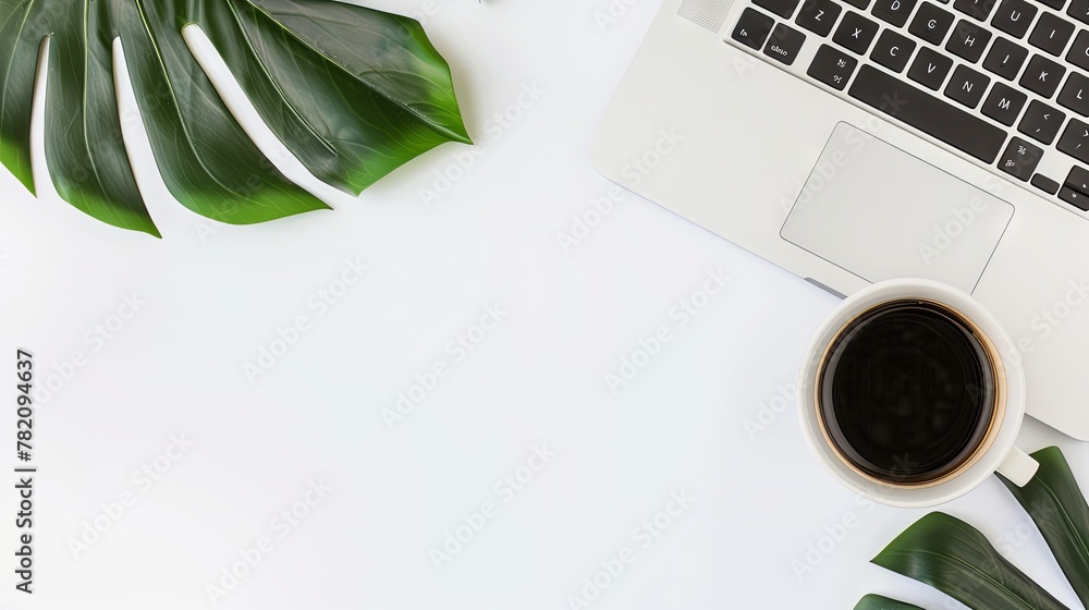 Fototapete white empty background with a laptop and coffee in the right part of the image and a green leaf in t