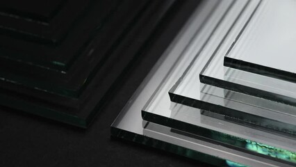 Sheets of Factory manufacturing tempered clear float glass panels cut to size.