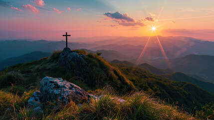Cross on the top of the mountain with sunset background