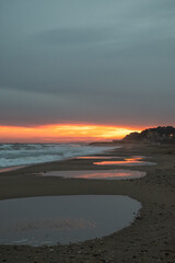Sunset on Altafulla beach after a heavy storm