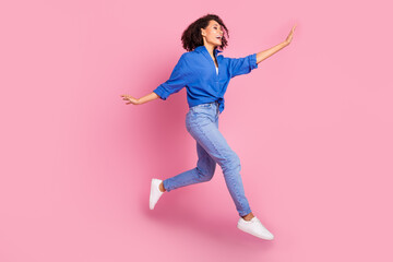 Photo of crazy carefree cheerful girl wear trendy clothes going hurrying looking empty space...
