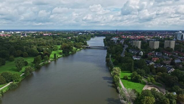 An aerial drone view of Aasee Lake in M&uuml;nster . Lake Aasee is an artificial lake located in M&uuml;nster , Germany .