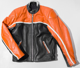 an unbranded heavy racing vintage Men's Motorcycle Leather Jacket Black Orange Racing Style. protection and style vintage motorcycle motorbike culture.