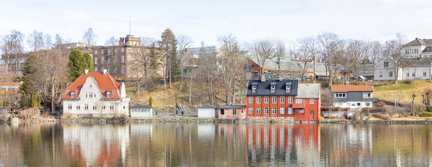 Walking along Nidelven (River) in a Spring mood in Trondheim city - 782108293