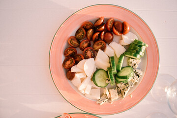 starter plate with cheese, onions and tomatoes 