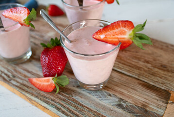 Strawberry dessert with quark and yogurt in glasses