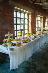 table setting at restaurant for a dinner, delicious dishes, food, holiday mood