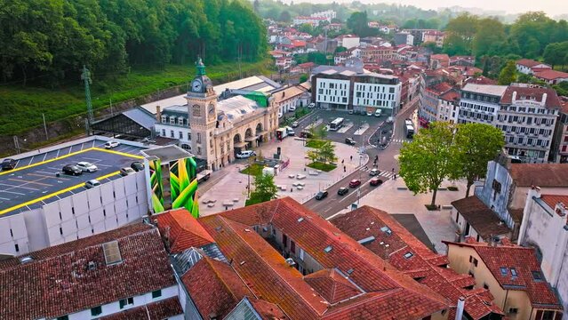 Aerial view of Bayonne city in Basque Country region by the river. Narrow medieval streets and red rooftop buildings. Basque culture and history. Southwest France, where the Nive and Adour rivers meet