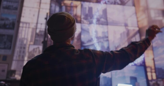 A Man Standing In Front Of A Virtual Screen With A Hand Up Science Museum Video Art Motion Graphics