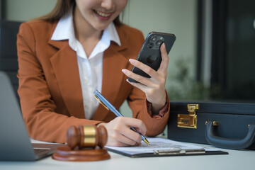 Asian legal compliance, faculty of law, legal counseling office, a female lawyer reads a contract,...