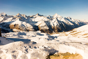 Snowy mountain during the day in winter. Zermatt, swiss alps