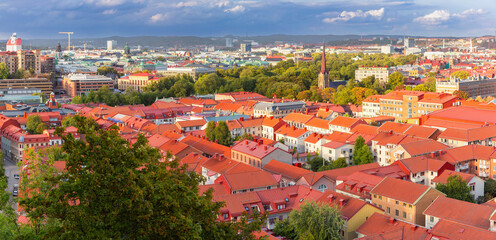 Scenic aerial view of the Old Town with Haga Church and red roofs at sunset, Gothenburg, Sweden.