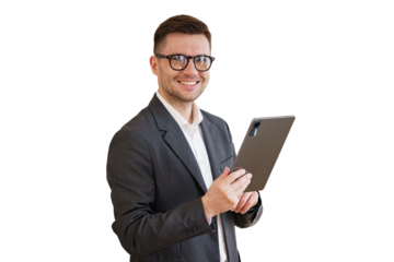 The manager is a positive man in a suit using a tablet.