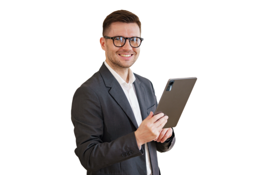 The manager is a positive man in a suit using a tablet.