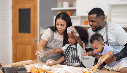 Family Bonding Over Baking Bread Using Online Recipe in Cozy Home Kitchen